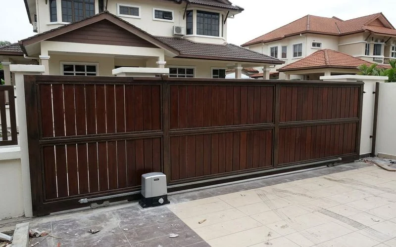 Completed sliding autogate installation at a Malaysian residential property with remote control system